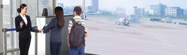 Airport terminal officer assists customers